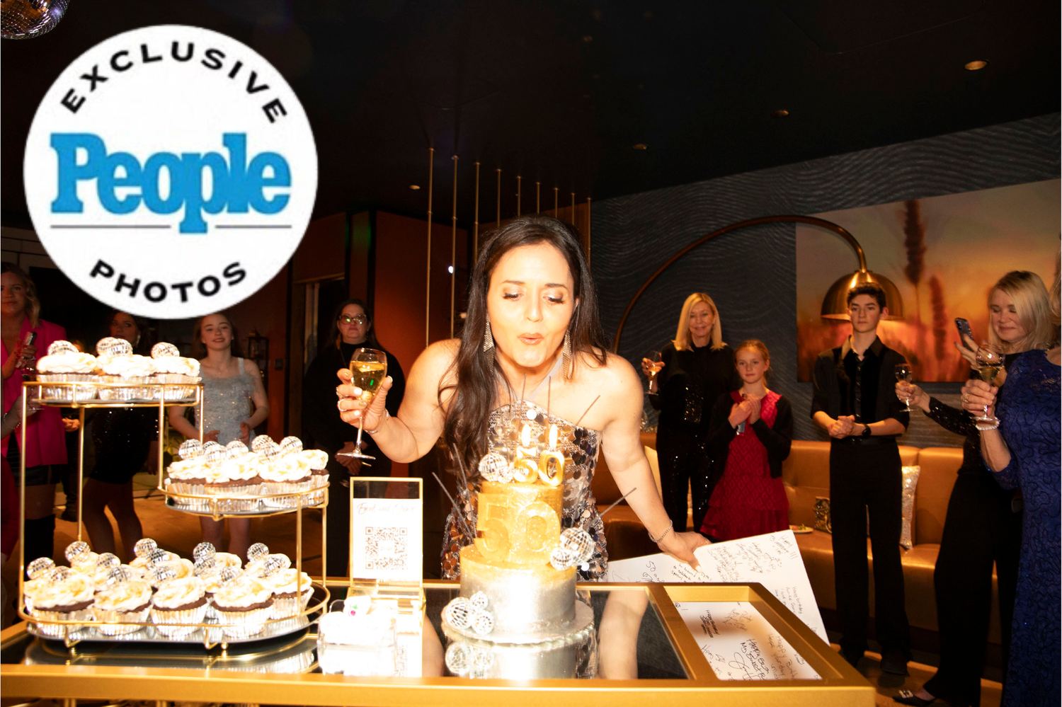 Birthday celebration with a gold cake
